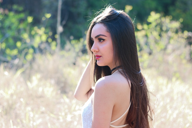 headshot, outdoors, look, looking over shoulder, one person, women, beauty, woman, focus on foreground, beautiful woman, plant, profile view, landscape