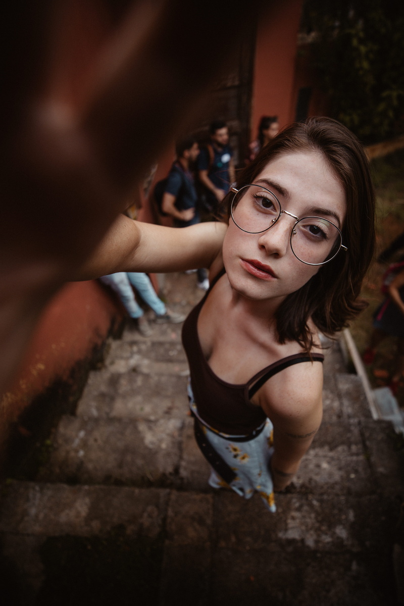 hands, urban, incidental people, pretty, wear, street, female, stairs, daytime, attractive, eyes, two people, beautiful woman, daylight, looking at camera