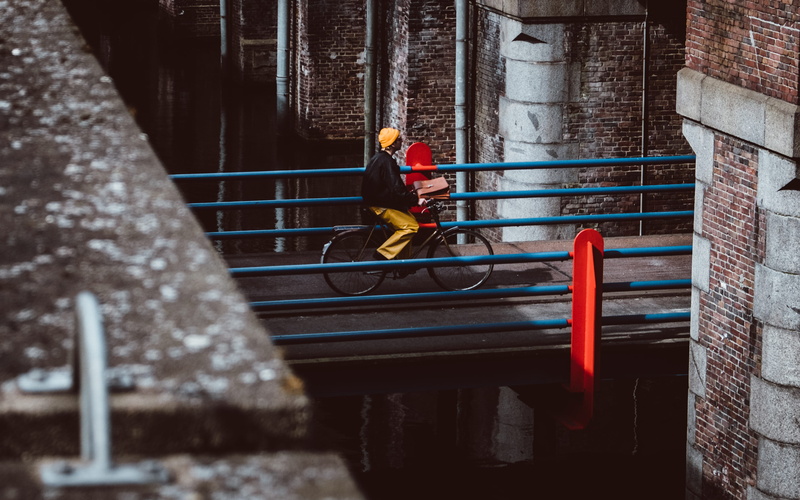 leisure activity, cycling, cycle sign, day, clothing, concrete, along, bicycle, person, chromatic, architecture, gray, marckleen, daytime, sport, sports equipment