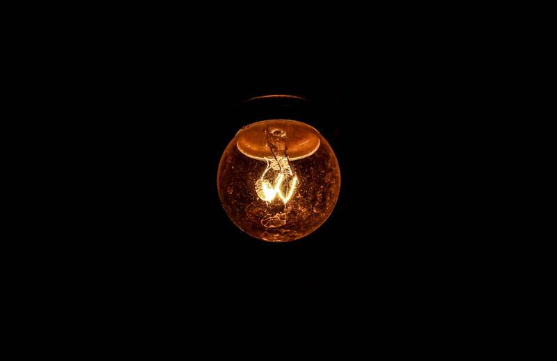 glowing, dark, district, copy space, the darkness, single object, studio shot, power supply, indoors, incandescent bulb, darkroom, low angle view, glass - material