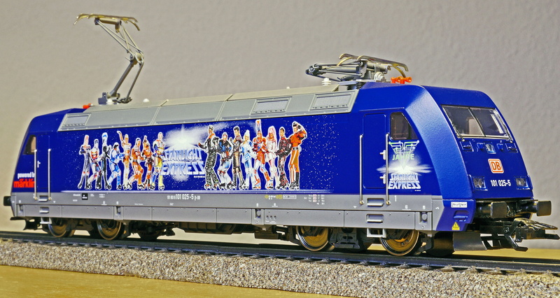 wall - building feature, track, transportation, deutsche bahn, musical, sponsored, train - vehicle, locomotive, outdoors, mode of transportation, blue