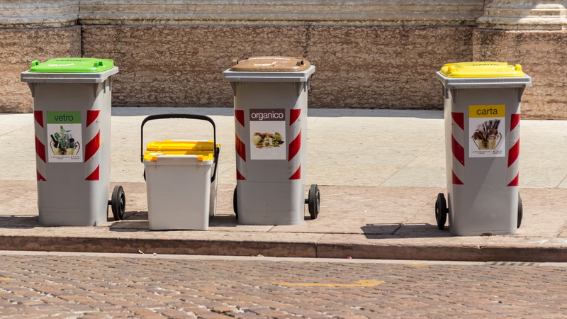 side by side, garbage, street, mülltonnen, built structure, wall - building feature, outdoors, city, text, plastic, sunlight, ton, disposal, italy, sidewalk