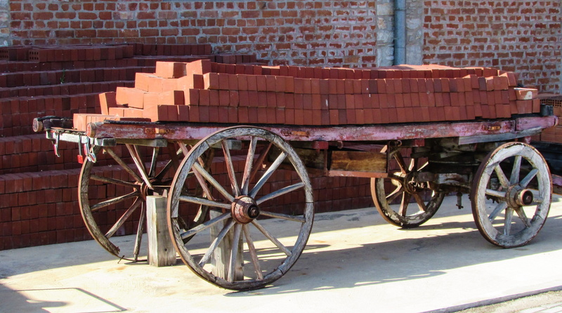 wheel, brick, greece, brick wall, built structure, restoration, wall - building feature, shadow, day, volos, outdoors, city, museum, building, old factory