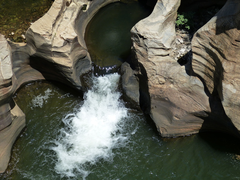 power in nature, gorge, drakensberg mountains, day, flowing water, beauty in nature, hole, waterfall, waters, canyon, rock formation, no people, long exposure