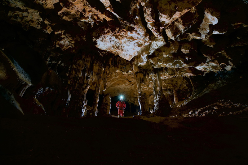 geology, vacations, backlighting, nature, adventure, trip, indoors, potholing, sénaillac, people, real people, rock, men, gulf, cave, lifestyles, rear view