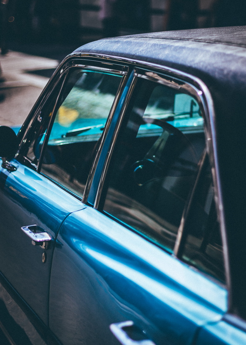 outdoors, mode of transportation, car, blue, window, reflection, automotive, vehicle window, vintage car, classic car, depth of field, land vehicle, classic