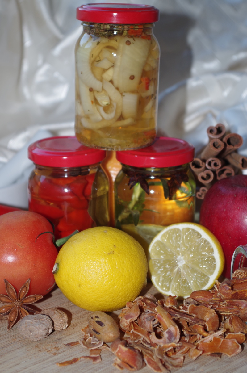 wellbeing, mace, preserves, star anise, citrus fruit, indoors, variation, choice, lemon, bottled, red, large group of objects, container, freshness, nutmeg