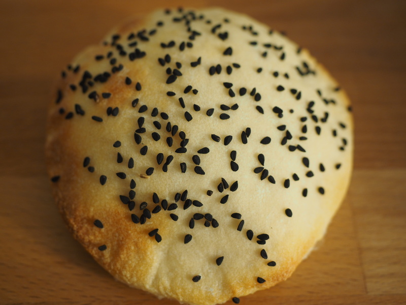 flat bread, still life, single object, no people, seed, wood - material, roll, crispy, temptation, wellbeing, indoors, healthy eating, baked, glazed food
