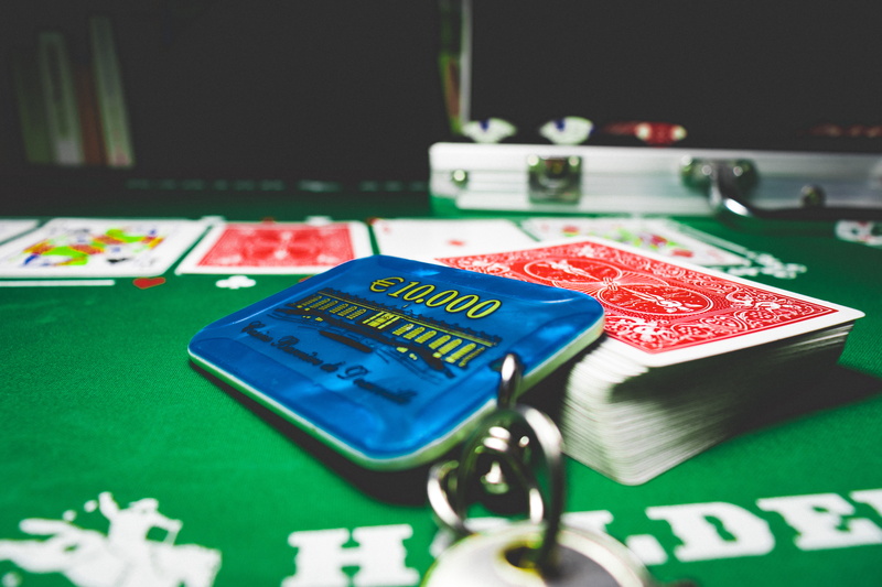 communication, leisure games, poker - card game, close-up, vélizy-villacoublay, gambling chip, cards, no people, indoors, money, poker, opportunity, selective focus