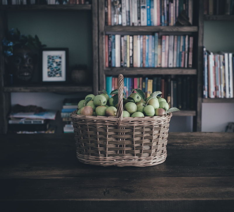 shelf, book, apple - fruit, food and drink, windfall, book case, apples, indoors, choice, wellbeing, basket, bunch, bookshelf, brown, no people, 2K, container