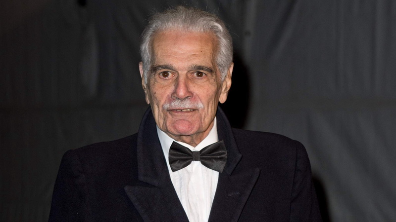 serious, 1080P, senior men, front view, adult, indoors, beard, portrait, bow tie, actor, tuxedo, omar sharif, arms raised, one person, mouth open, looking at camera