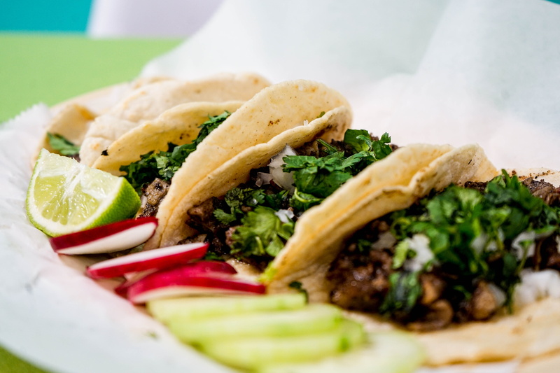 indoors, mexican food, food and drink, pita bread, serving size, tortilla - flatbread, vegetable, meat, selective focus, taco, plate, sandwich, food, herb