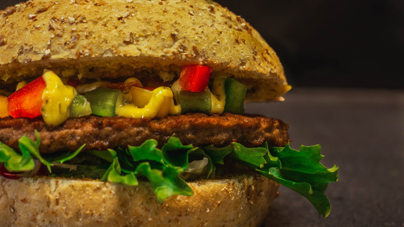 pasta, produce, take out food, sandwich wrap, cheeseburger, food, arugula, lettuce, dairy product, burger, ready-to-eat, meat loaf, bun, cornbread, jalapeno pepper