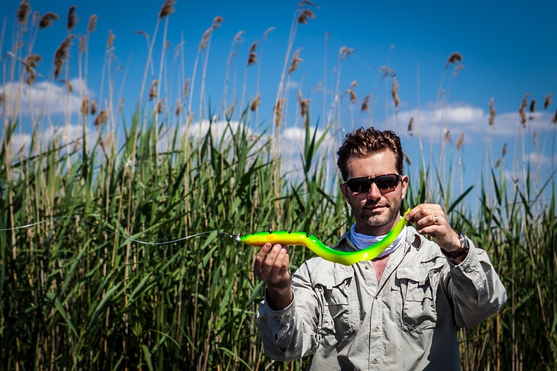 front view, portrait, young men, glasses, eel, plant, real people, growth, standing, young adult, casting lure, one person, sunglasses, fisher, fishing lure