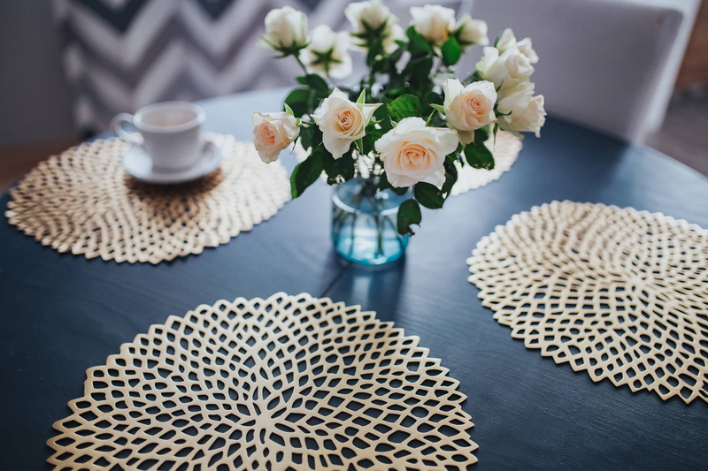 beauty in nature, food and drink, nature, place mat, flower arrangement, high angle view, decor, coffee table, white, decoration, mat, blue, drink, no People