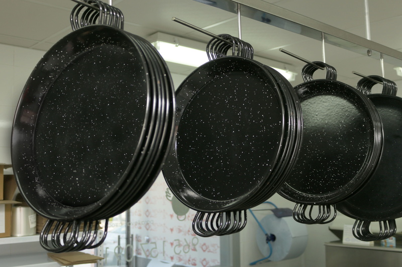 hanging, in a row, clean, still life, Paella, focus on foreground, metal, Franchise, black rice, Food, close-up, no People, steel, valencian paella, black color
