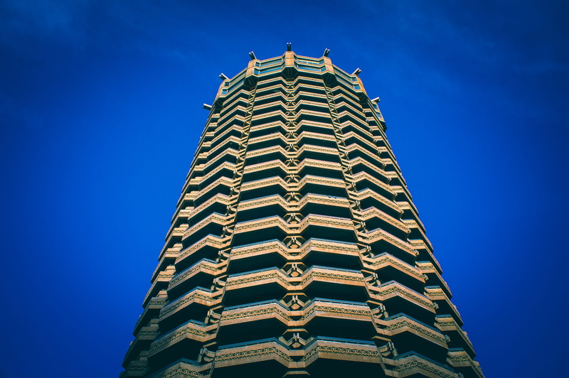sky, architecture, spire, building exterior, belief, spain, no people, clear sky, office building exterior, directly below, viewpoint, spirituality, day