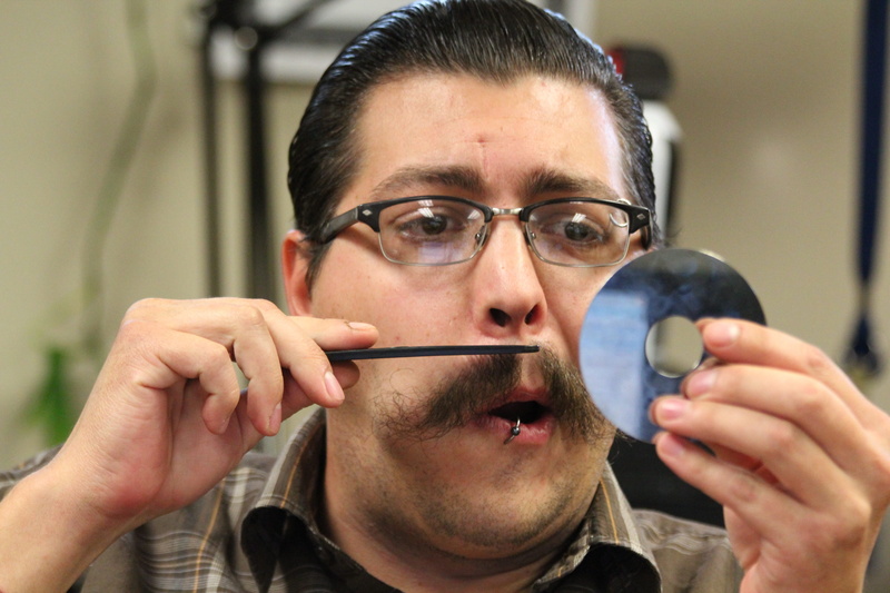 daytime, looking, headshot, dvd, reflective, reflection, comb, disk, trimming, close-up, one person, facial hair, man, human face, hand, contemplation
