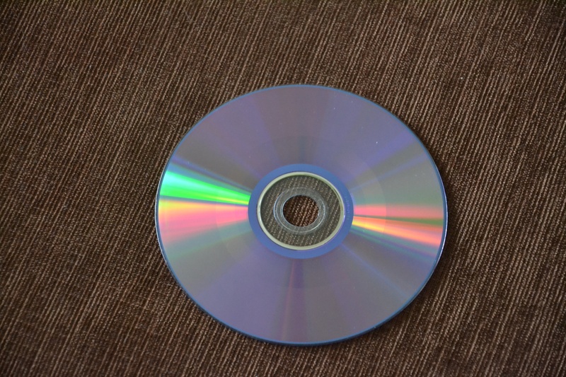 blue, full frame, 2K, arts culture and entertainment, technology, multi colored, motherboard, blank, music, retro styled, compact disc, turning, shape