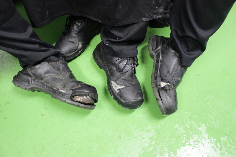 bali, indoors, adult, high angle view, male, 5K, feet, man, shoe, men, real people, hotelier, low section, water, body part, lifestyles, green color, modern slavery
