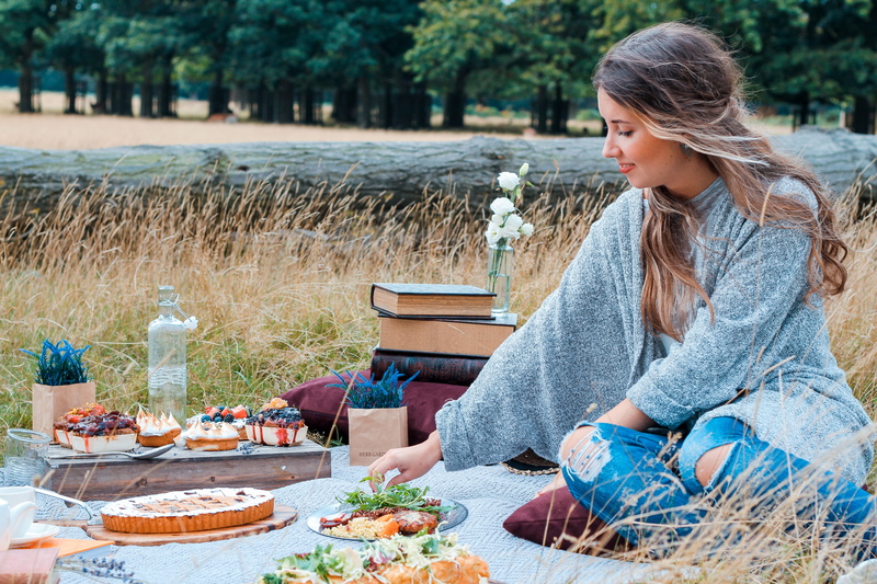 wild life, leisure activity, woman, cake, book, casual clothing, hair, adult, tree, young women, forest, nomad, person, happiness, sitting, women, mat