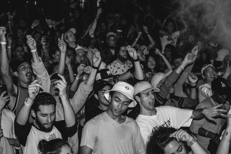 entertainment, leisure activity, people, performance, popular music concert, hands up, large group of people, real people, nightlife, rave, black-and-white