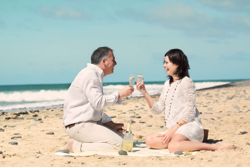 caucasian, cheerful, day, comfortable, emotion, beach, dancing, sitting, sand, couple, beauty, female, men, lifestyles, nature, leisure activity, affectionate