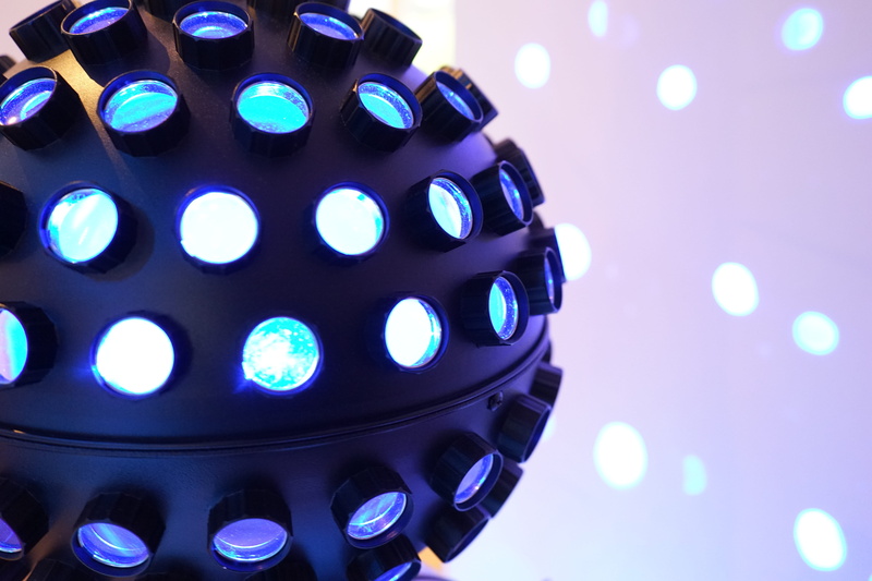ball, no people, arts culture and entertainment, black, geometric shape, studio shot, equipment, dance, nightlife, indoors, multi colored, electricity