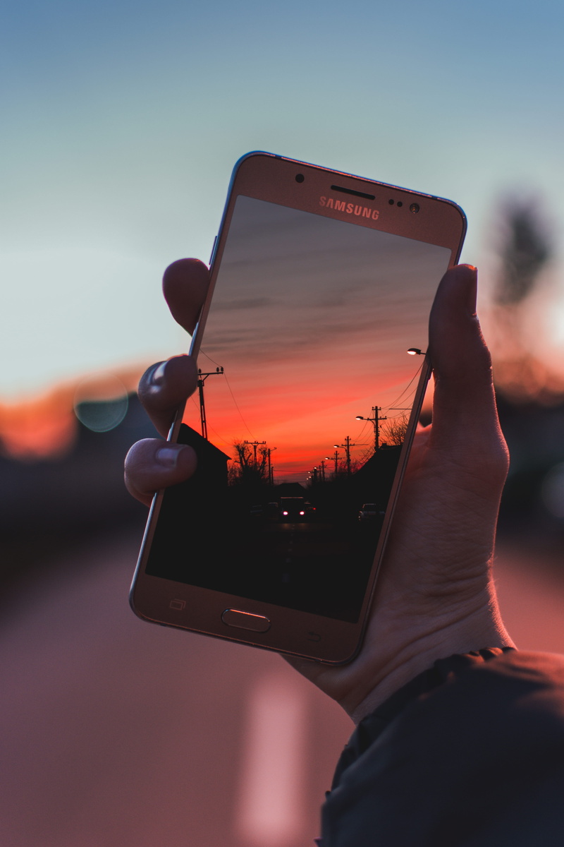 dof, nature, close-up, sunset, human hand, holding, timisoara, samsung, orange color, one person, person, 5K, smart phone, electronics, cell phone, real people