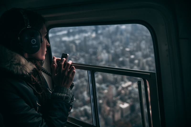 indoors, real people, young adult, adult, vehicle, looking, beside, sitting, woman, headphones, vehicle interior, transportation, lifestyles, person, electronics