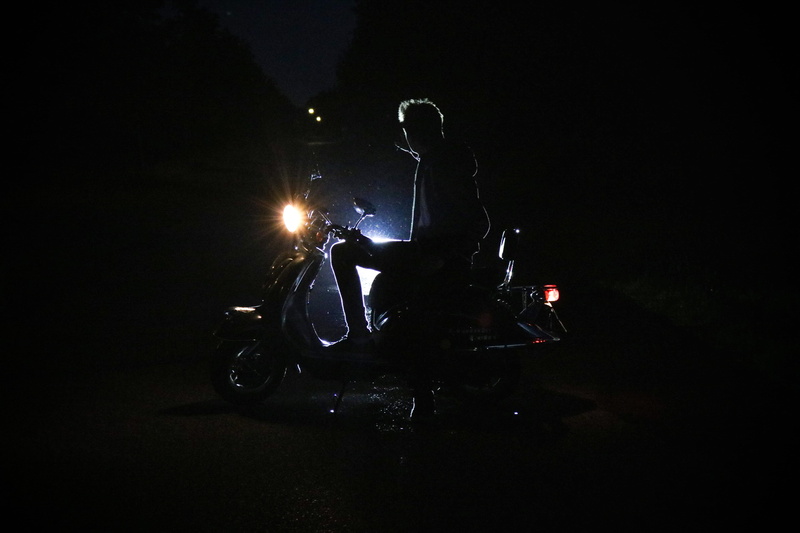 headwear, head, mask, reach, transportation, stationary, crash helmet, driving, urban, down, eden, long, illuminated, hands, lights, road, riding, hair