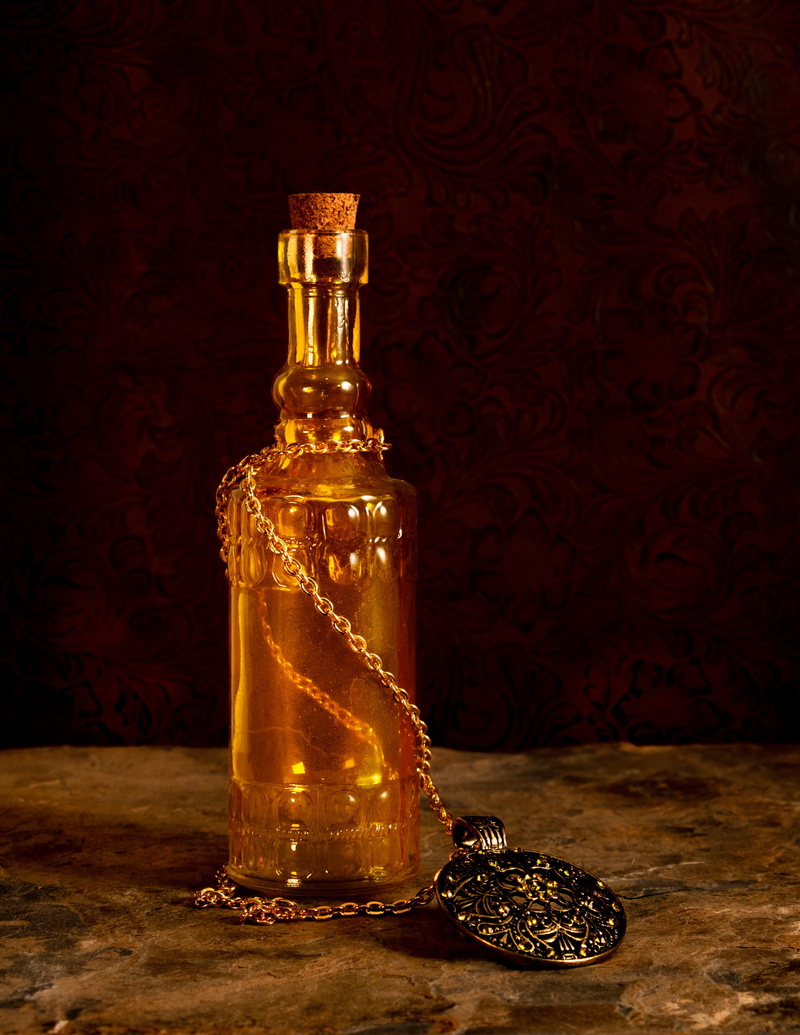 luxury, jewelry, green, studio shot, bottle, antique, yellow, close-up, container, wealth, still life, gems, glitter, gold colored, table, single object