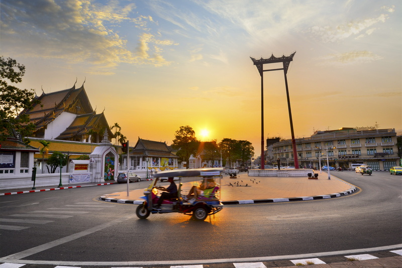city, mode of transportation, red, road, outdoors, leisure activity, land vehicle, building exterior, 5K, lifestyles, scooter, riding, built structure