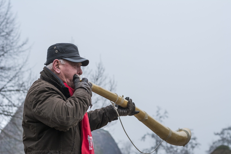 one person, adult, clothing, winter, Advent, Midwinter Horn, mid adult, blowing, horn blowing, rear, twente, outdoors, standing, warm clothing, nature