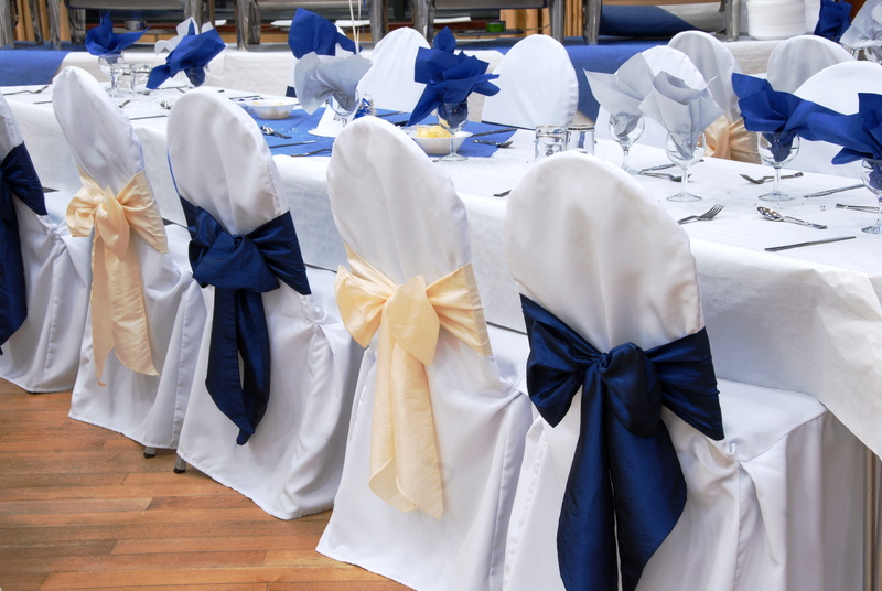 clothing, white color, fancy, life events, indoors, no people, dining, arrangement, group, wedding ceremony, religion, table, bow, event, decor, covers