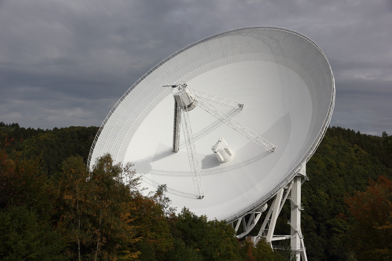 space, cloud - sky, science, arts culture and entertainment, tree, satellite dish, day, sky, amusement park ride, satellite, exploration, reflector, built structure