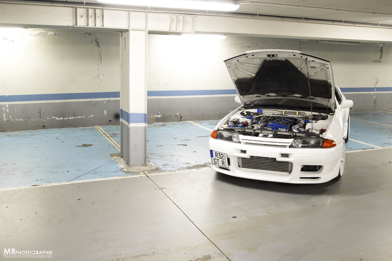 architecture, water, 5K, white color, car, no people, mode of transportation, nature, land vehicle, indoors, sea, Nissan Skyline R32, flooring, nautical vessel