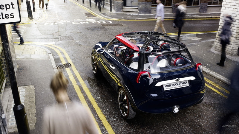 real people, mini rocketman concept cars, people, incidental people, mode of transportation, high angle view, car, speed, road, blurred motion, city, sports race