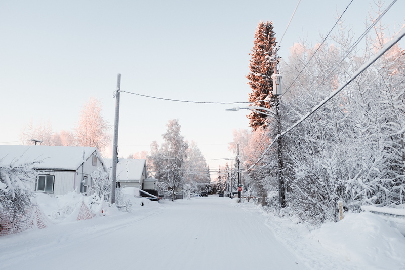 house, sky, utility pole, electricity, beauty in nature, snow, fairbanks, ice, land vehicle, snowing, car, outdoors, motor vehicle, abies, no people, building exterior