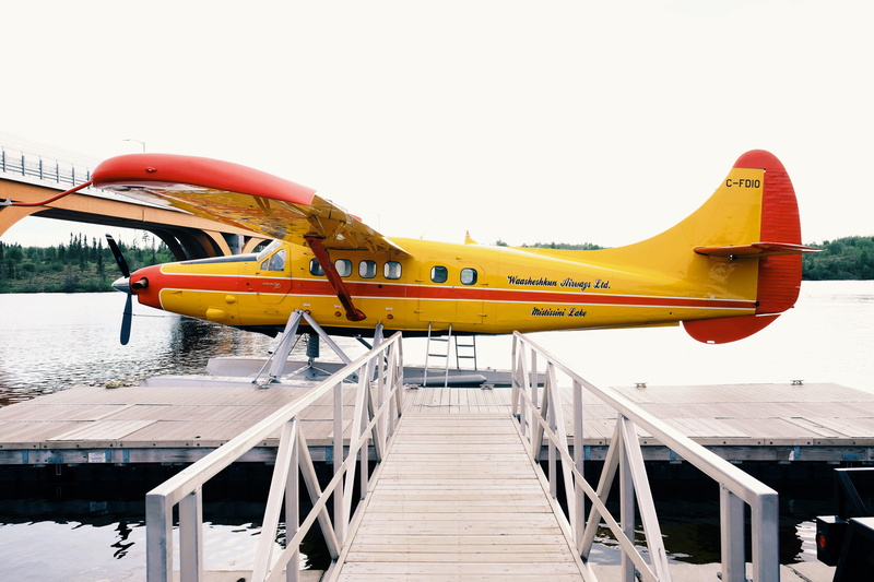 sky, bridge, nature, yellow, canada, airplane, northern quebec, day, built structure, air vehicle, north, dock, plane, cree village, absence, old, antique