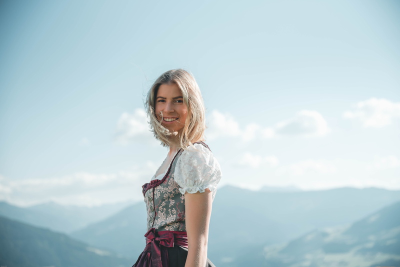 smiling, shoulder, scenics - nature, person, floral, happiness, looking at camera, fashion, day, dress, mountain range, beauty, hair, beautiful, beauty in nature
