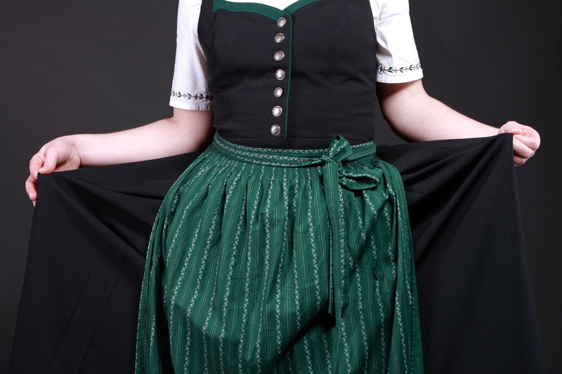 bavarian, apron, green color, people, black background, dress, one person, traditional clothing, fashion, indoors, woman, studio shot, black color, costumes