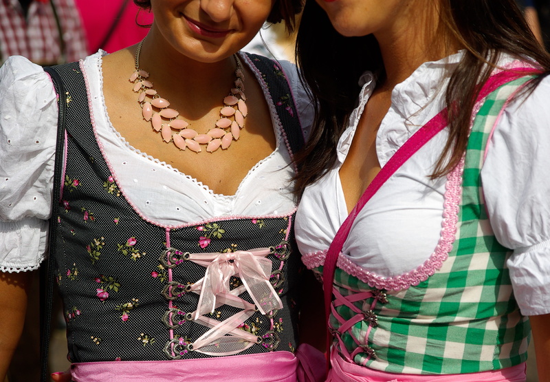 taking, midsection, people, indoors, lifestyles, scarf, emotion, photo, front view, women, 2K, two, dirndl, friendship, real people, clothing, traditional clothing