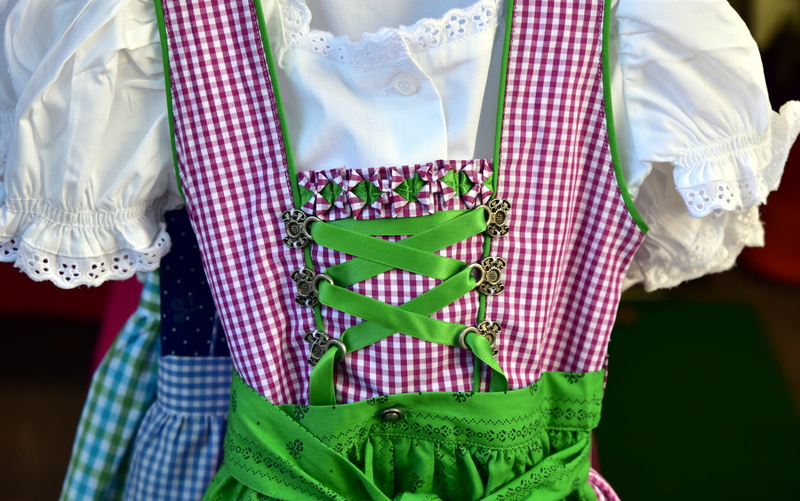 tradition, dirndl, clothing, green color, focus on foreground, fashion, adult, costume, close up, front view, pattern, sale, textile, midsection, womens clothing