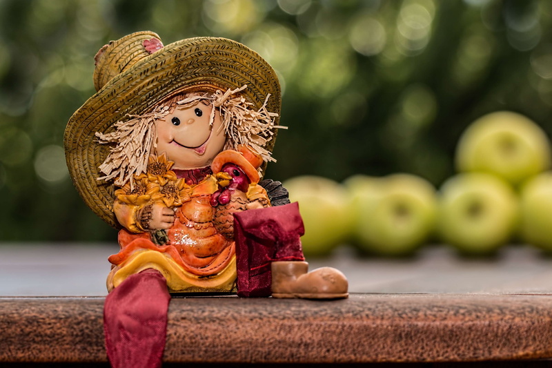 religion, straw, art and craft, creativity, focus on foreground, childhood, fruit, farm girl, happy, smiling, toy, human representation, 4K, organic, male likeness