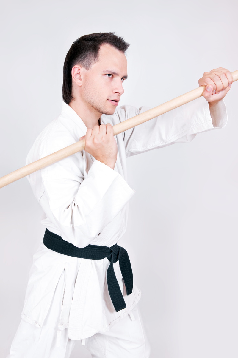 one person, martial, karate, fighter, train, lifestyles, sport, white background, self-defense, men, indoors, martial arts, adult, positive emotion, man