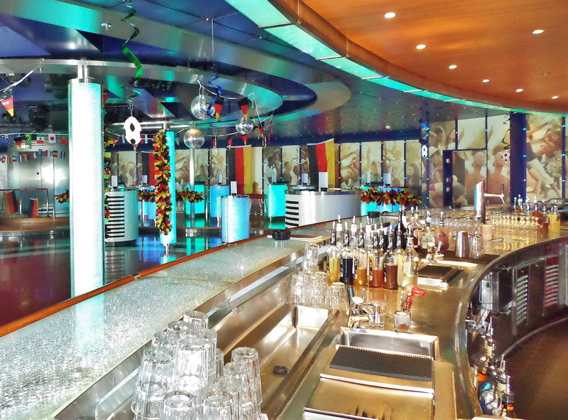 bottle, beverages, bottles, lighting equipment, ceiling, cruise, party, architecture, shopping mall, incidental people, consumerism, bar - drink establishment
