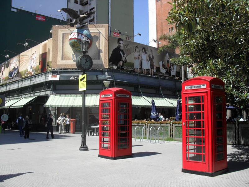 street, communication, public square, red, phone booth, postcard, transportation, text, building exterior, telephone, tree, sunlight, phone, connection
