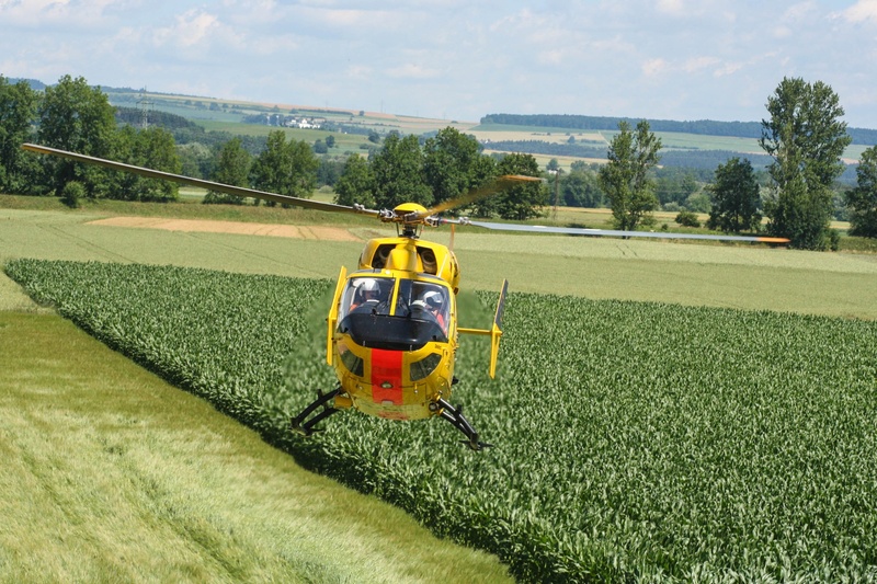 day, ambulance helicopter, land vehicle, fly, landscape, accident rescue, landing, 1080P, rescue helicopter, sunlight, sky, tree, rail transportation