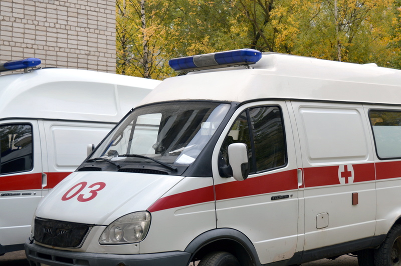 urgent care, mode of transportation, land vehicle, machine, glass - material, people, car, van - vehicle, red, service, van, parking, mini van, motor vehicle